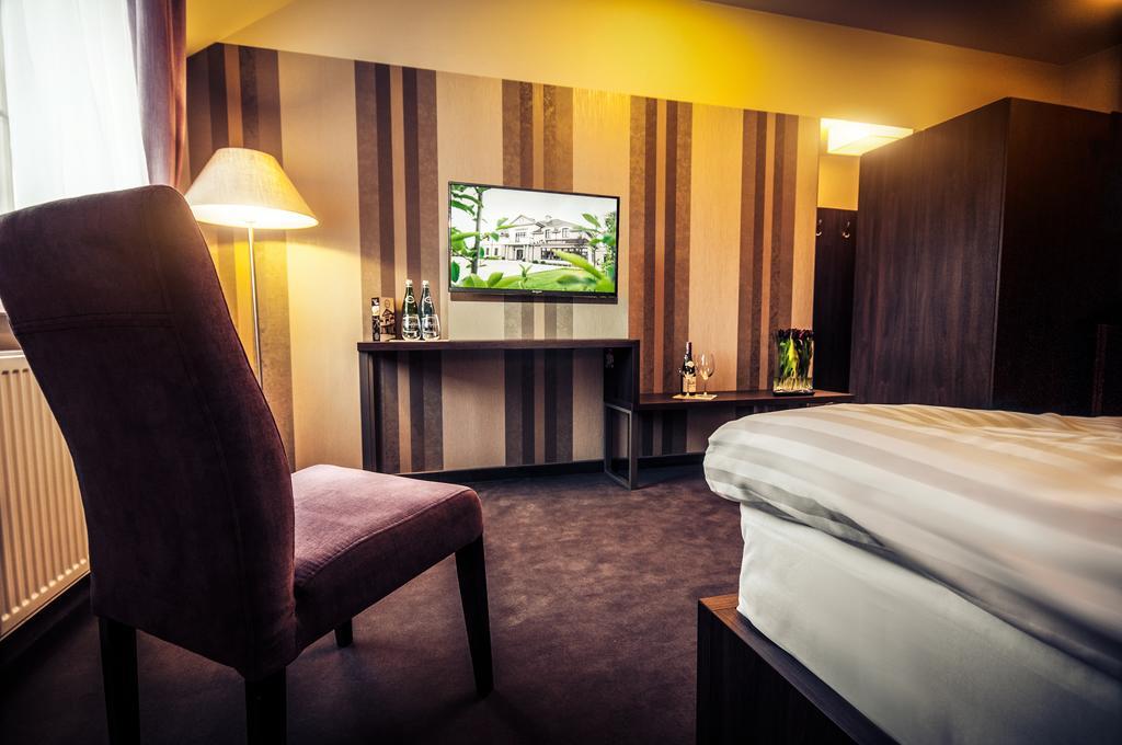 Hotel Figa Plewiska Rom bilde